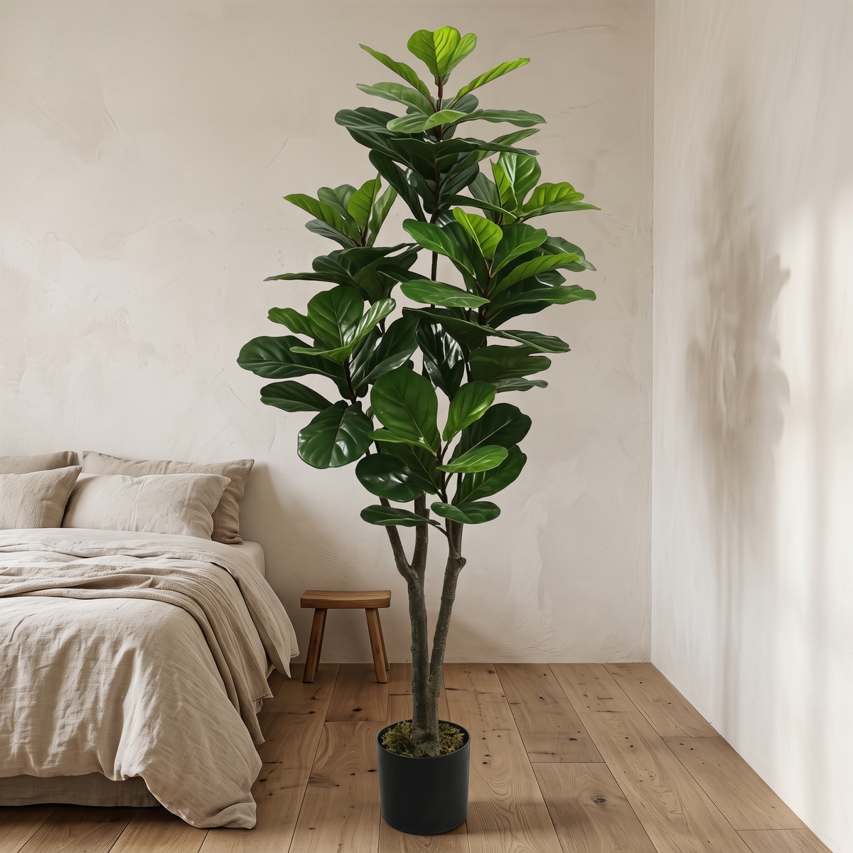 Artificial fiddle leaf fig tree with a textured trunk in a nested grower pot