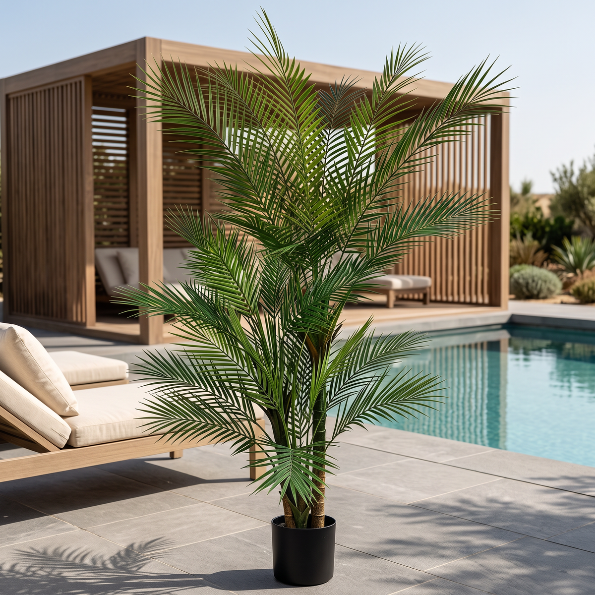 Artificial palm tree with UV-resistant fronds in a black pot