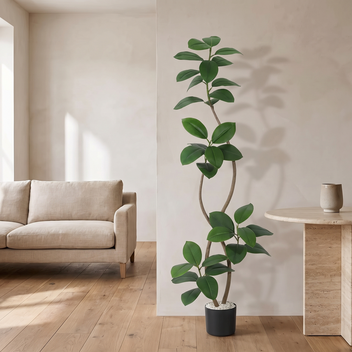 Artificial fiddle leaf fig tree in a black resin planter with a stone topper