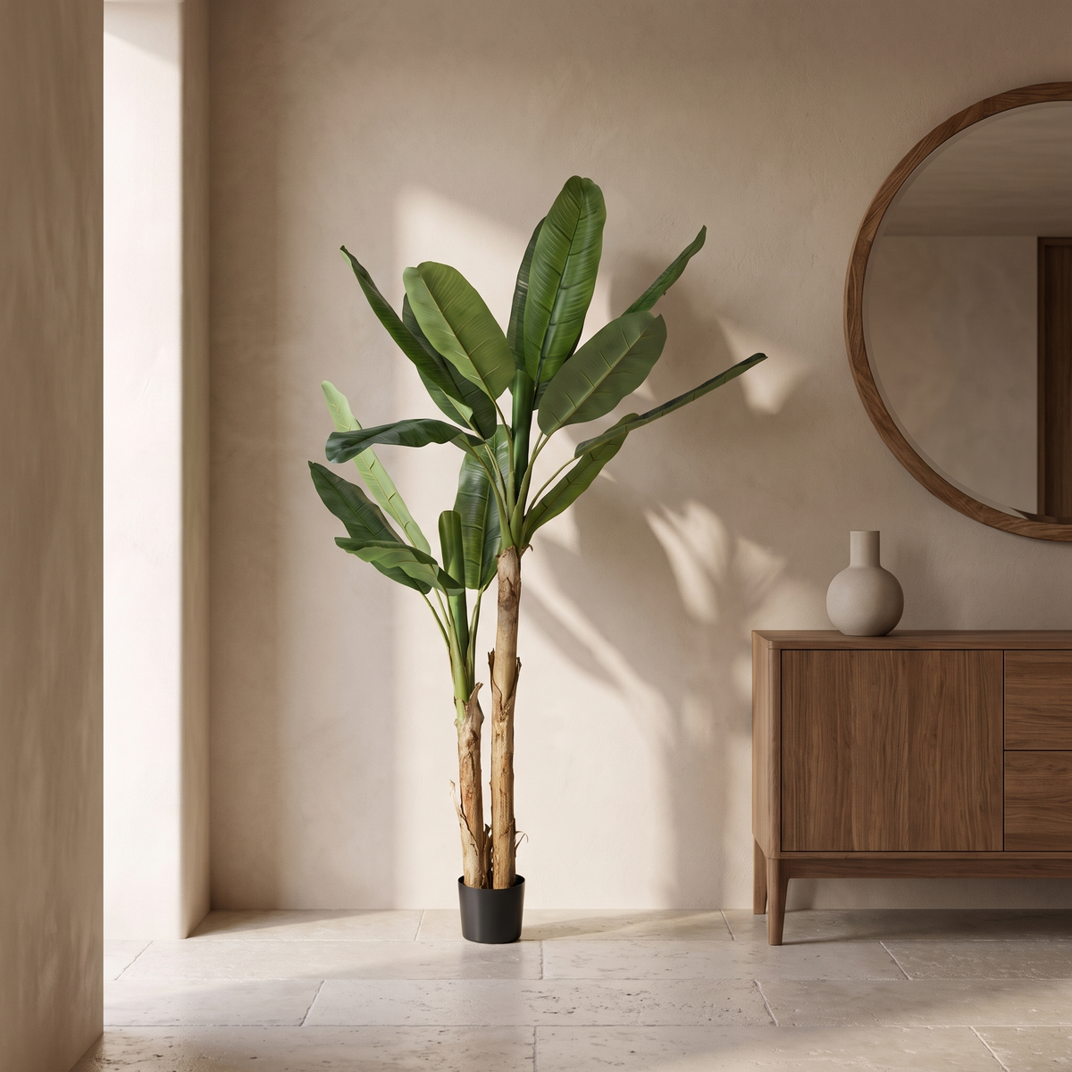Artificial banana tree with a dual trunk and variegated leaves