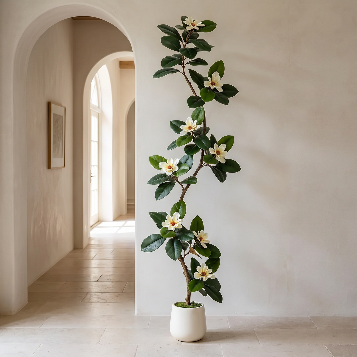 Artificial magnolia tree with an S-curve trunk in a white planter