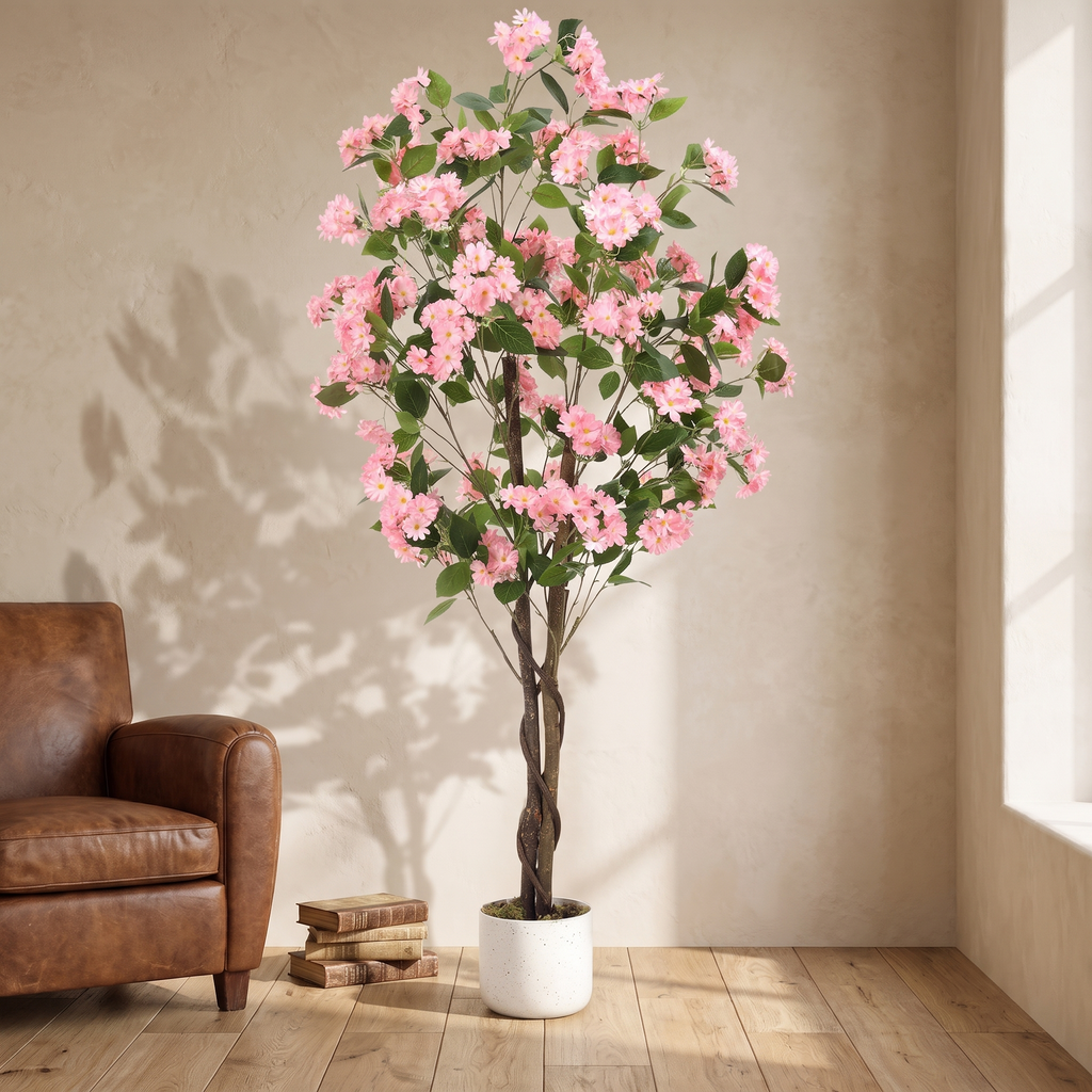 Artificial osmanthus tree with lifelike blooms on a weighted base