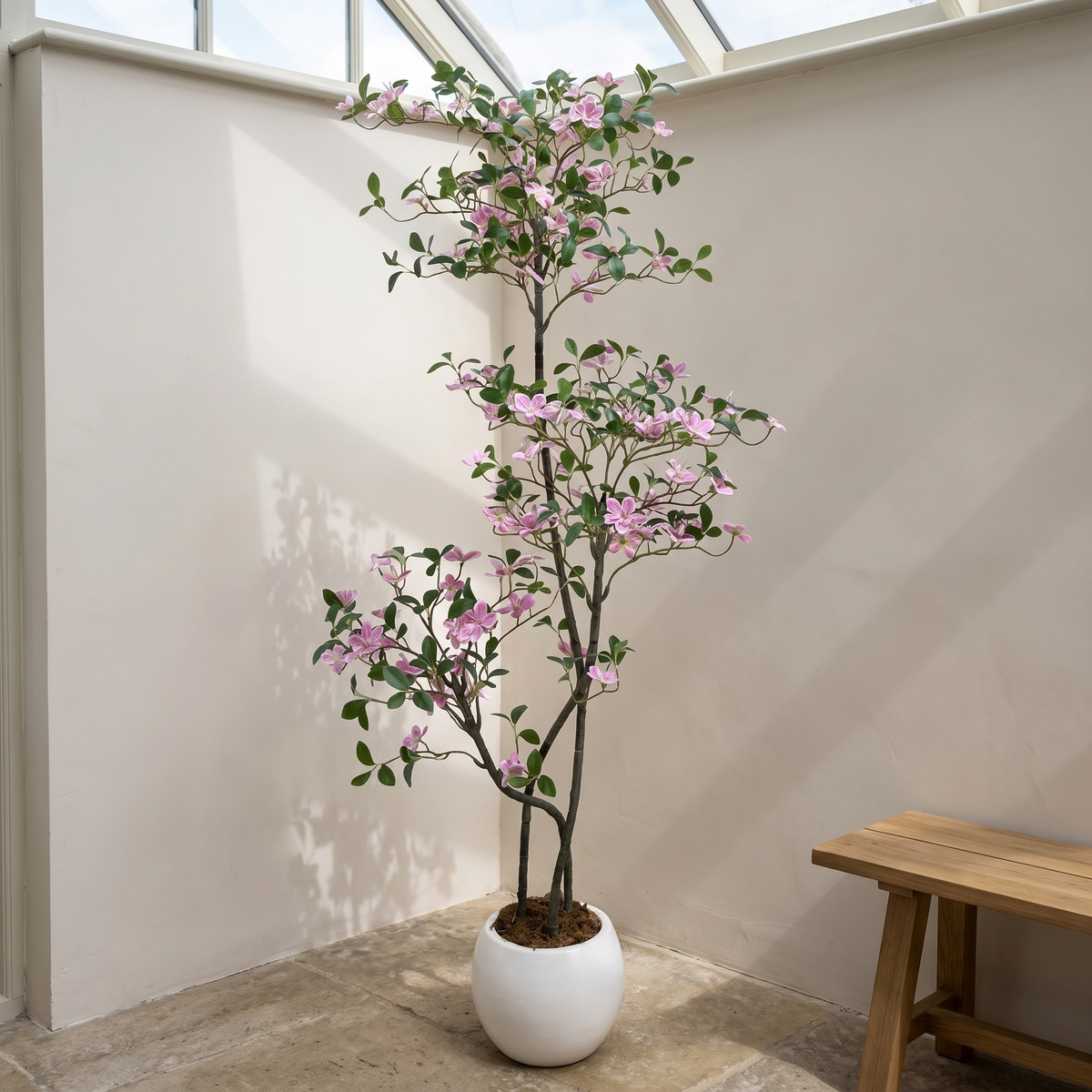 Artificial jasmine tree with silk blossoms on plastic stems