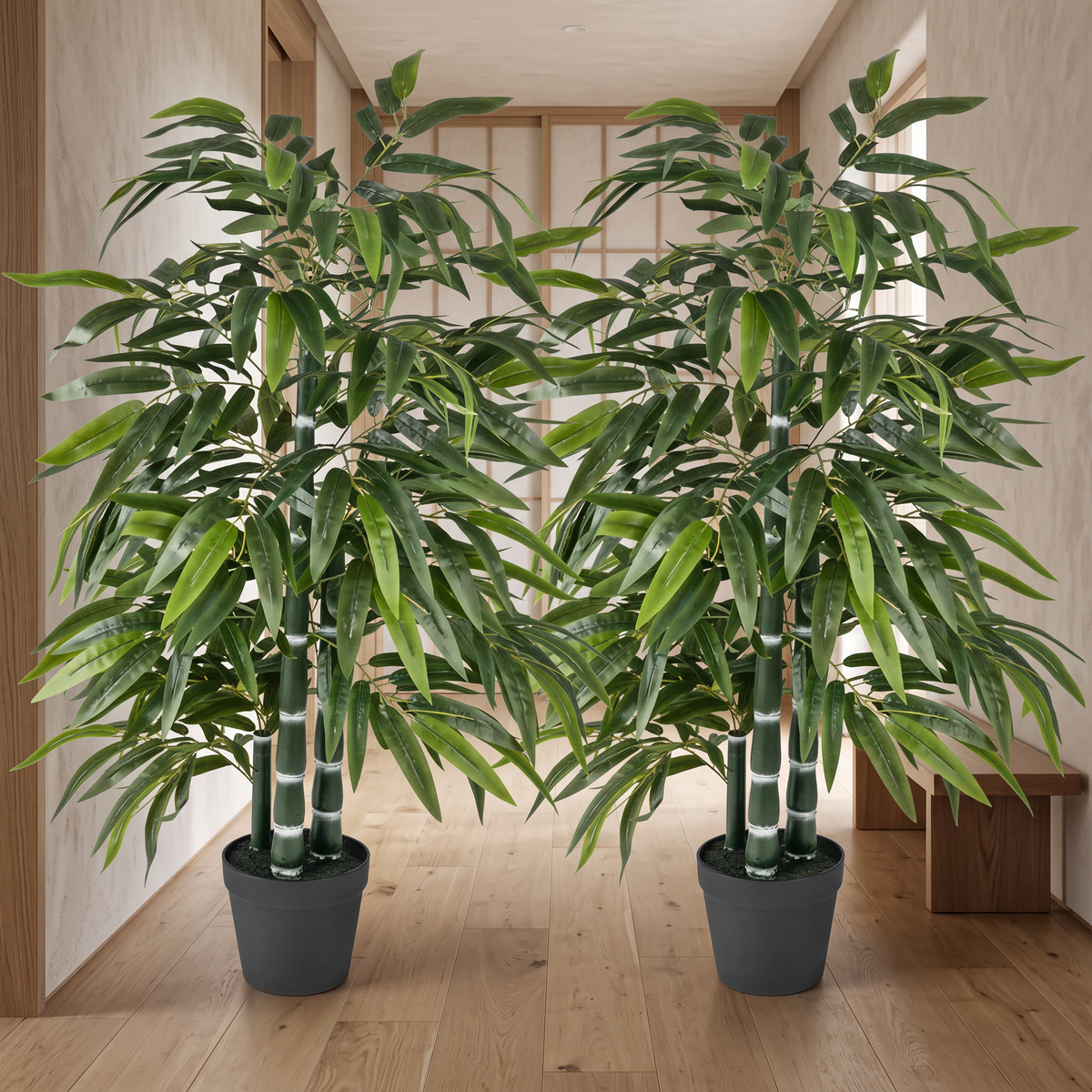 Pair of artificial bamboo trees, each with three trunks