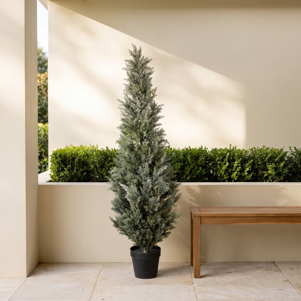 Artificial cypress topiary tree with UV-treated foliage in a black pot