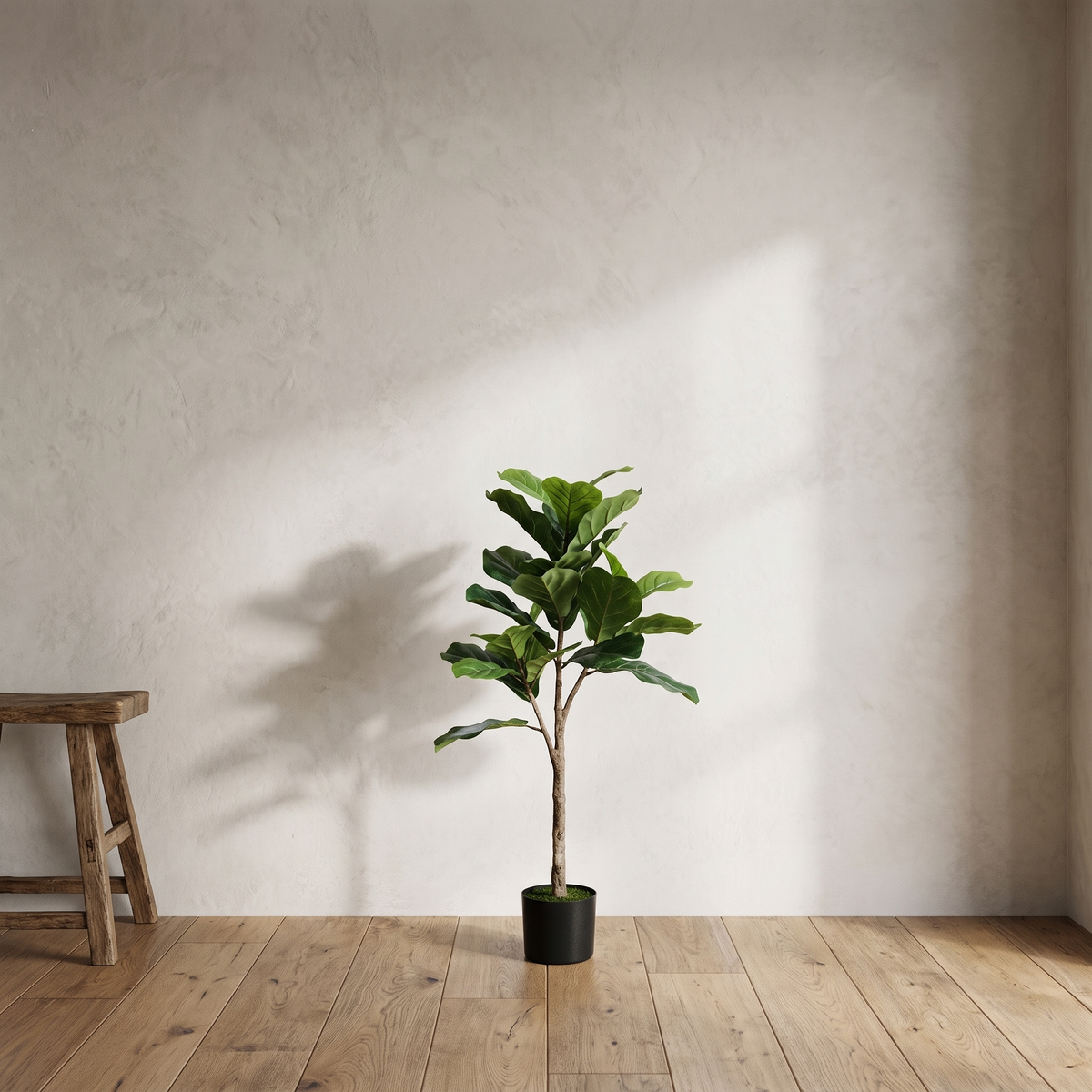 Artificial fiddle leaf fig tree with a flocked-soil finish pot