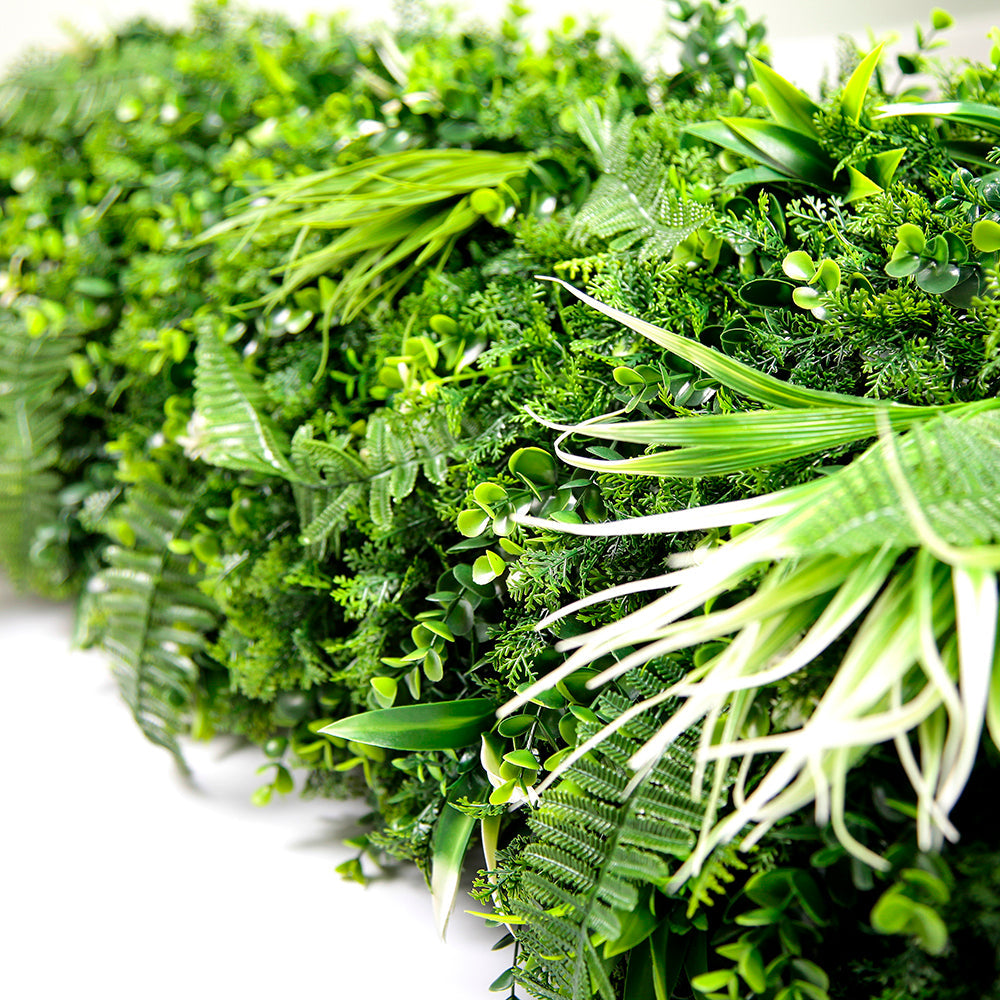 Vertical garden panelling framing a retail display area from floor to ceiling