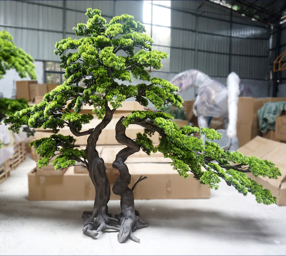 Artificial podocarpus pine with narrow green needles massed on layered branches