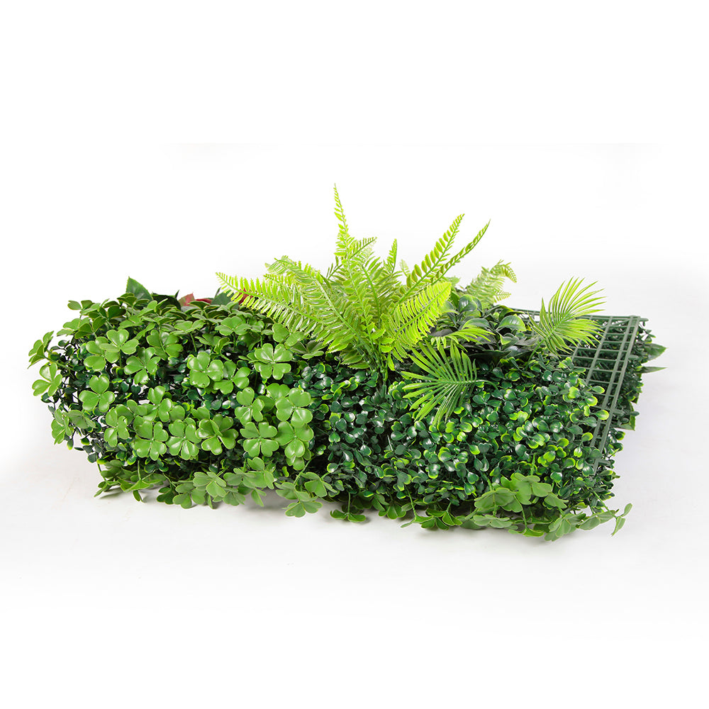 The tropical panel used as an event backdrop with foliage running corner to corner