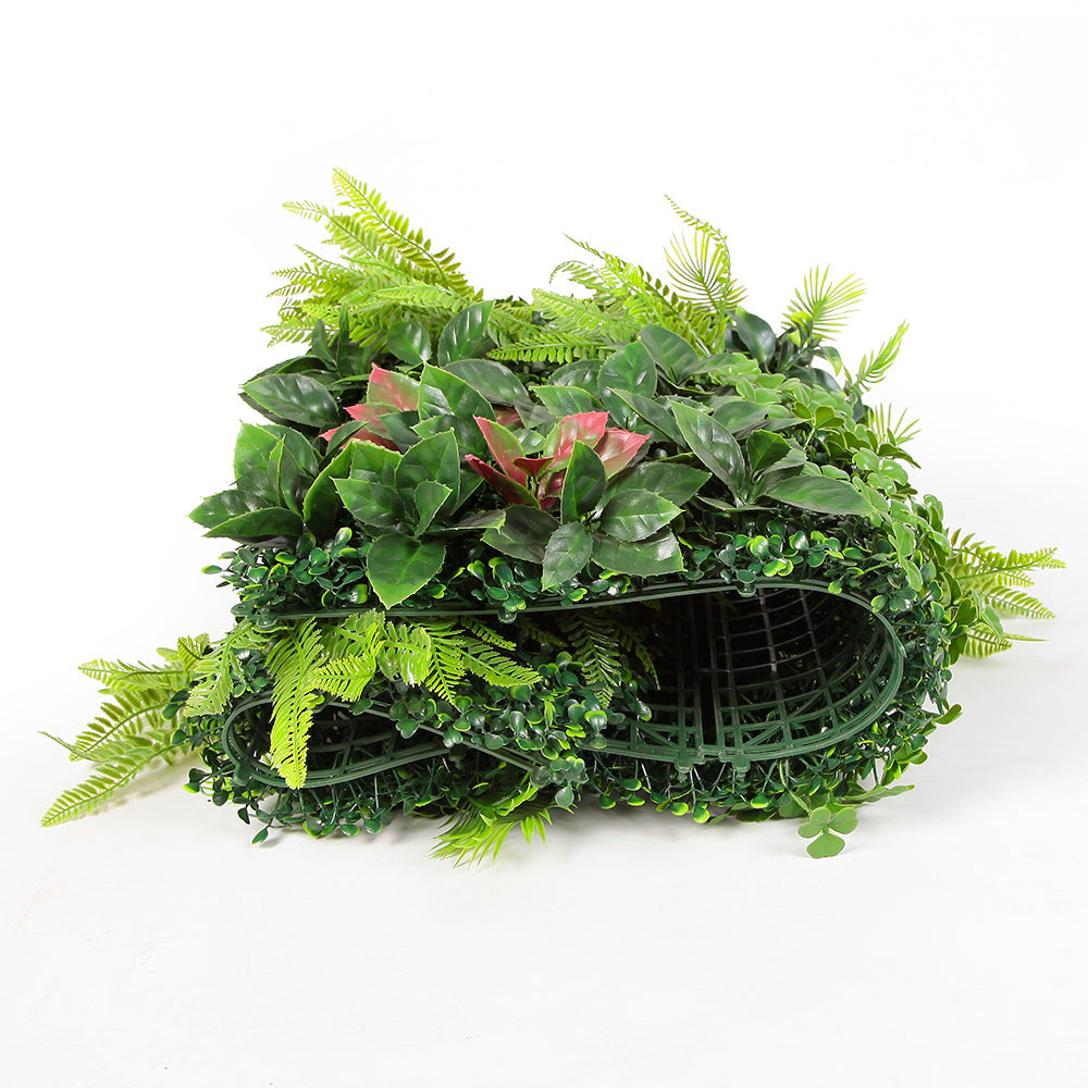 Two jungle panels joined so the leaf layers overlap and hide the seam between them