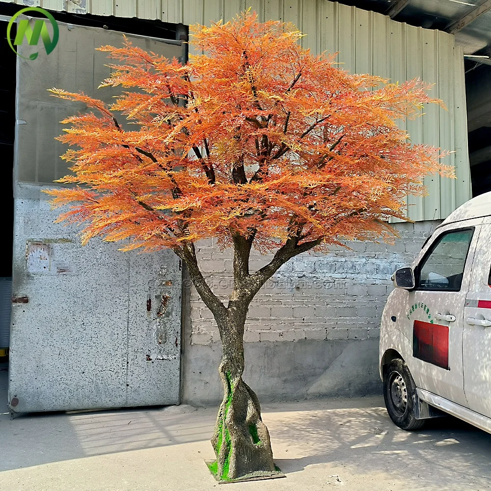 The water-resistant nandina planted in a garden landscape beside a patio