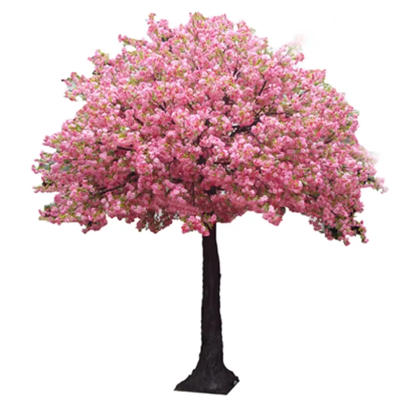 The sakura tree used as an event display beside a styled banquet table